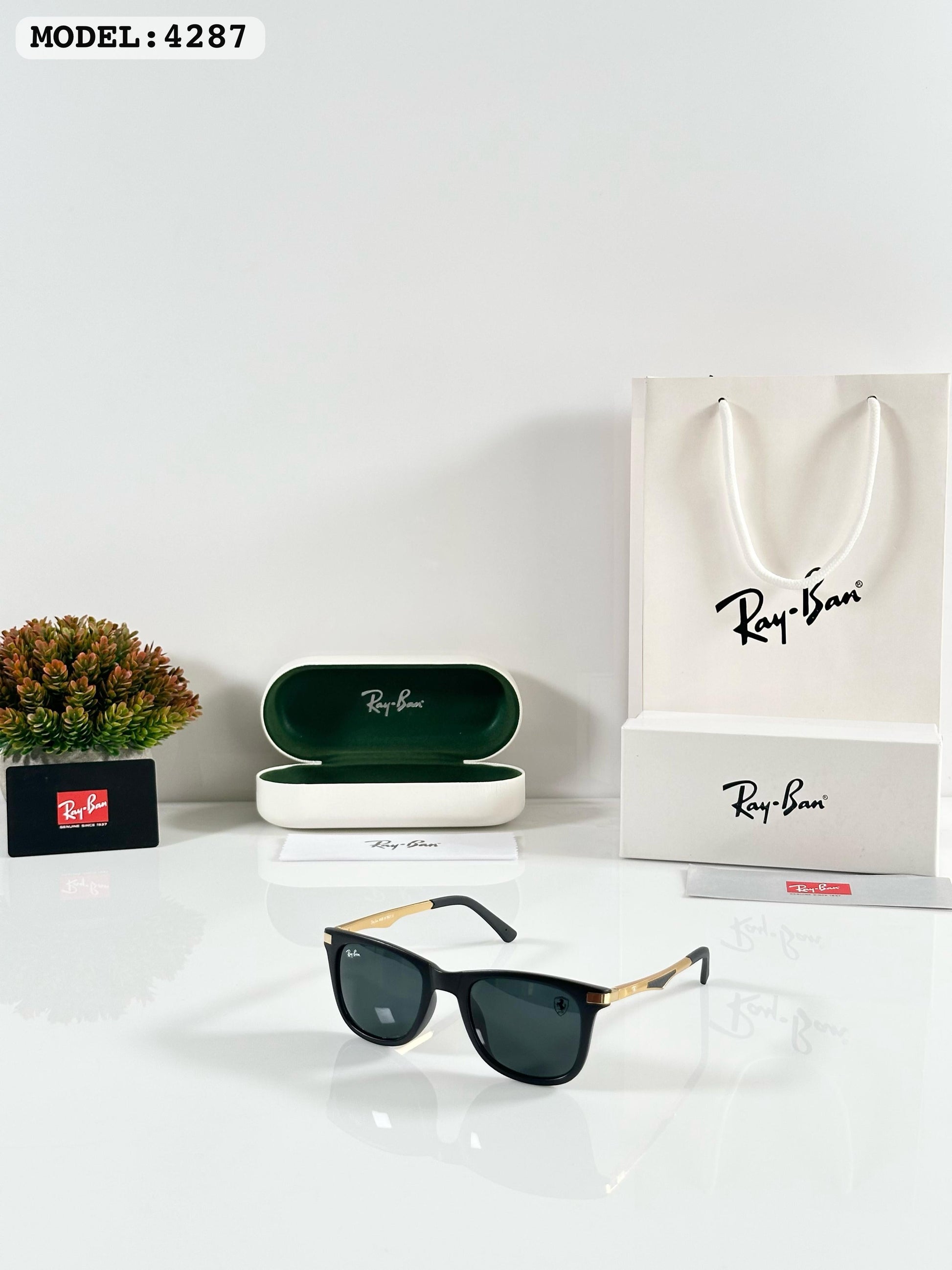 RAYBANN 4287 GOLD BLACK GLASS