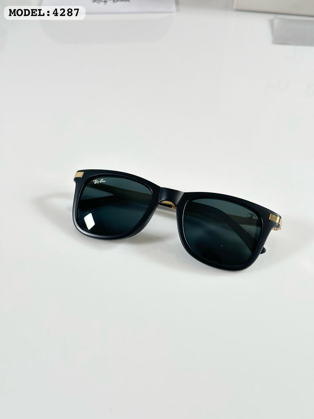 RAYBANN 4287 GOLD BLACK GLASS
