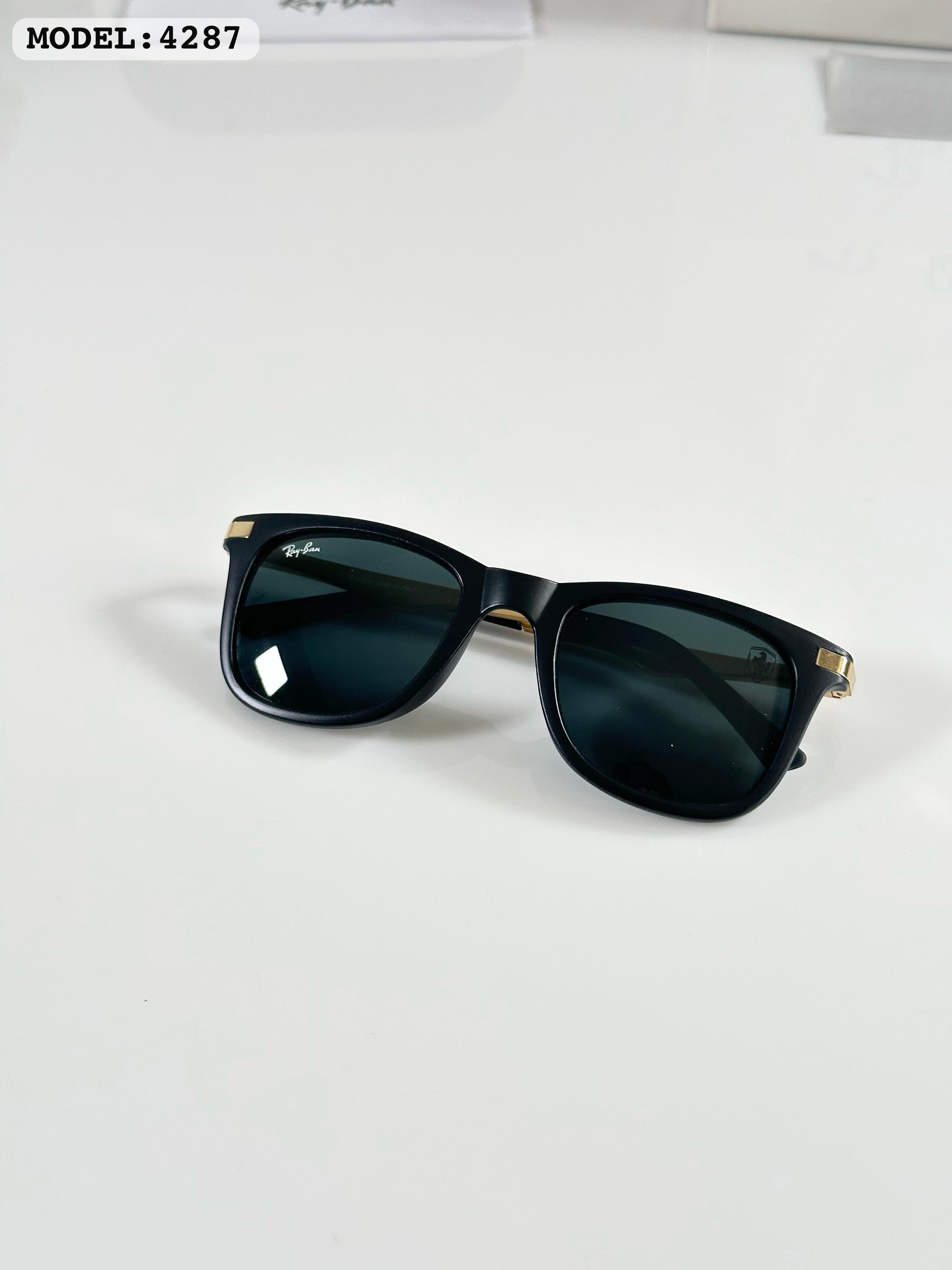 RAYBANN 4287 GOLD BLACK GLASS