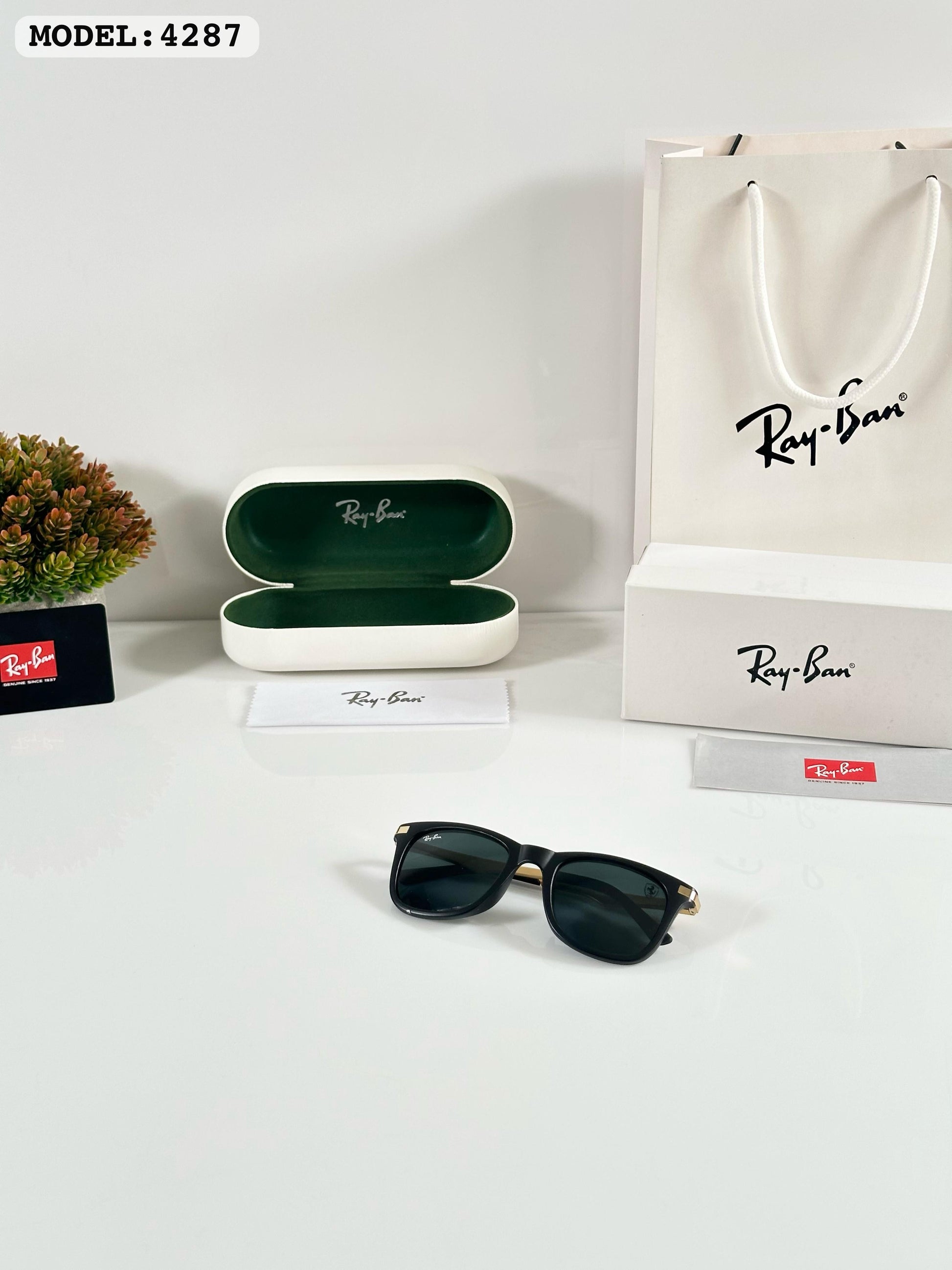 RAYBANN 4287 GOLD BLACK GLASS